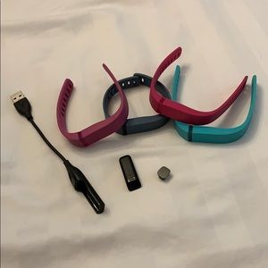Fitbit, four bands, connector and charger